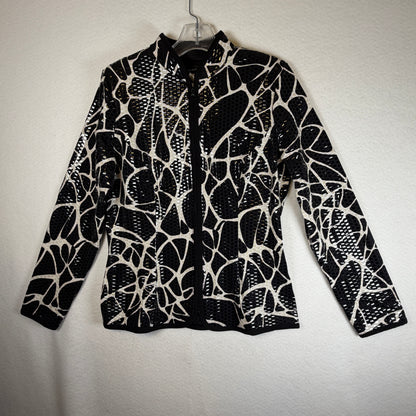 aDRESSing WOMAN jacket label and decorative zipper pull