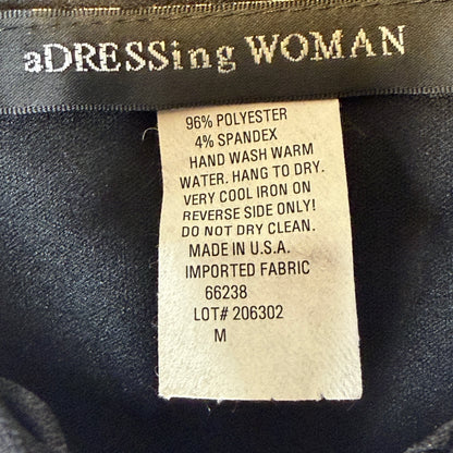 aDRESSing WOMAN Medium fabric and care label