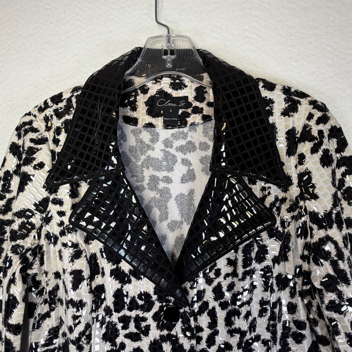 Clara S. Small size label and Made in China origin