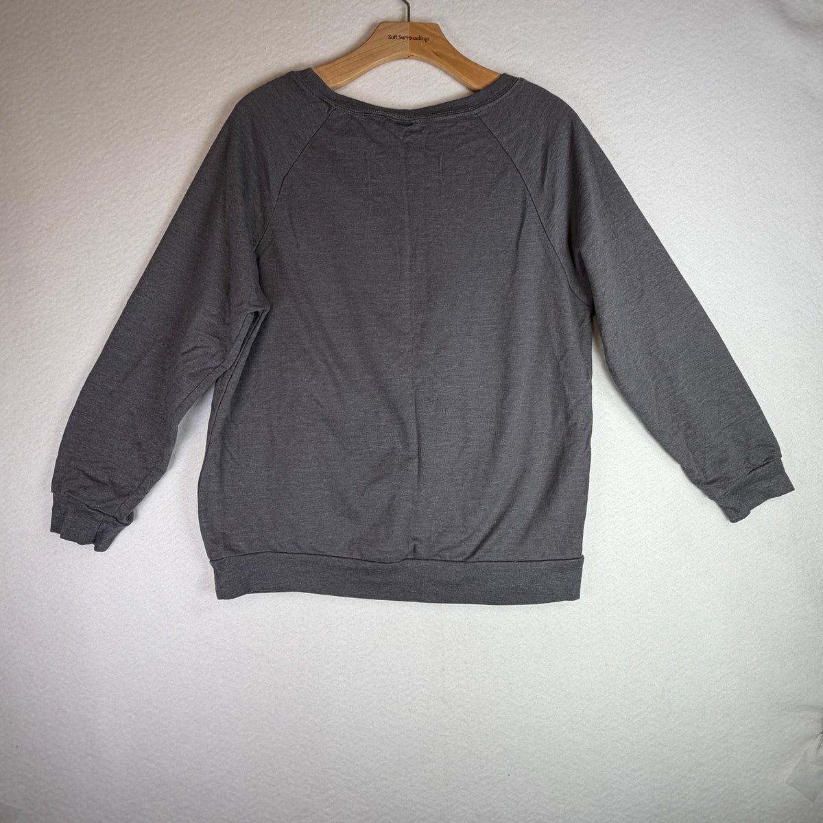 Front of gray Harley Quinn sweatshirt with red and black sequin diamond panel.