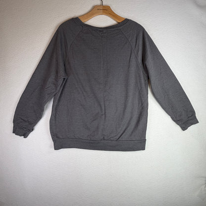 Front of gray Harley Quinn sweatshirt with red and black sequin diamond panel.