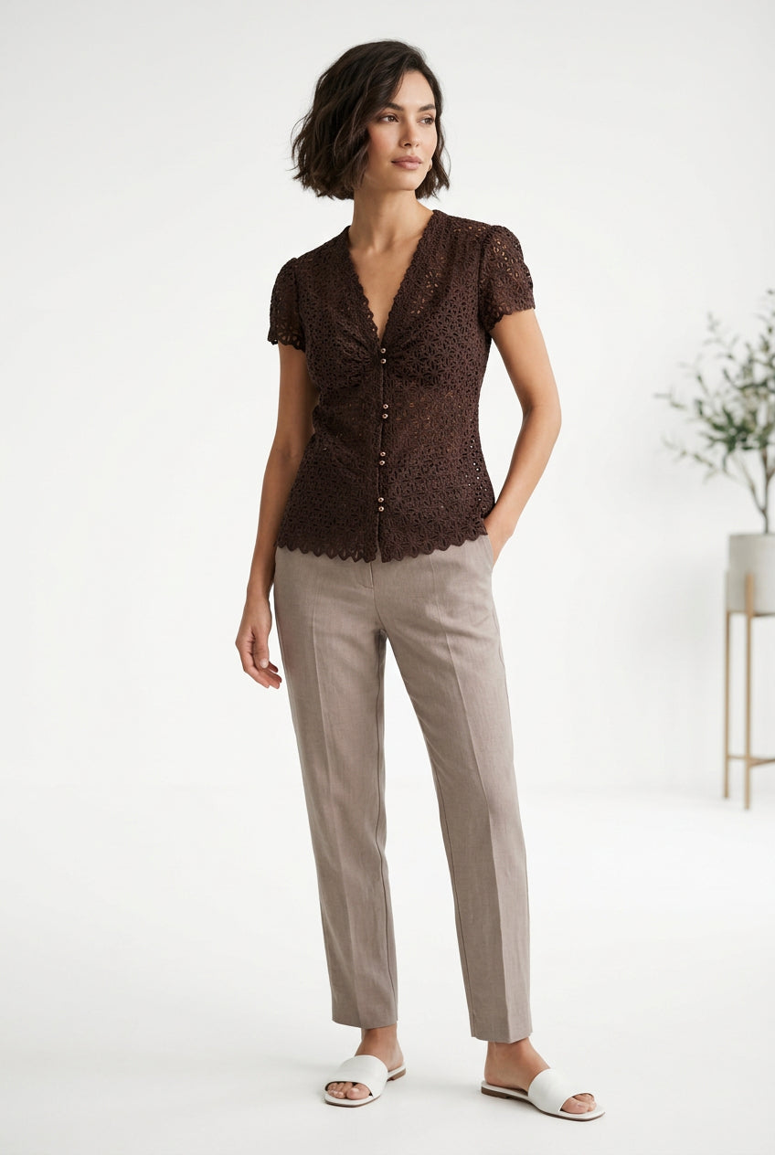 Front of brown Milly of New York eyelet button-front blouse