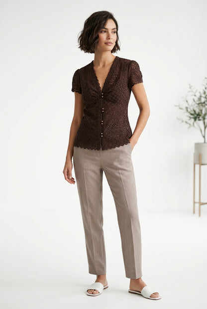 Front of brown Milly of New York eyelet button-front blouse