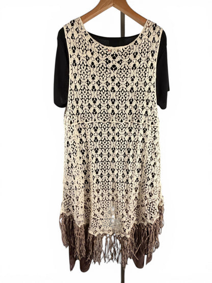 Leah Litty Lew The Boutique ivory crochet lace vest with fringe trim and open front design on a hanger