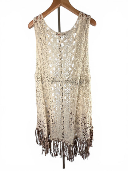 Leah Litty Lew The Boutique ivory crochet lace vest with fringe trim and open front design on a wooden hanger